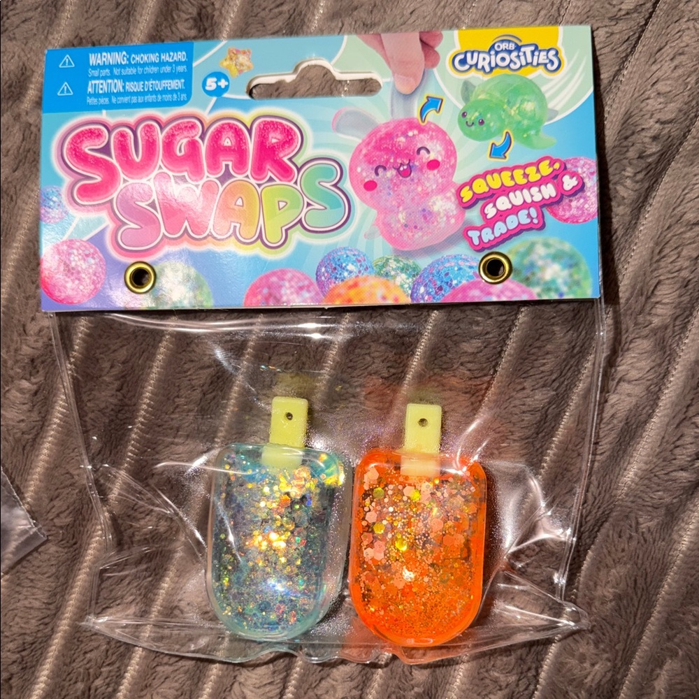 Sugar Swaps Glitter Squeeze Toys - Blue & Orange
